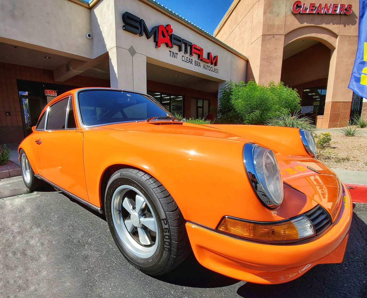 orange porsche front